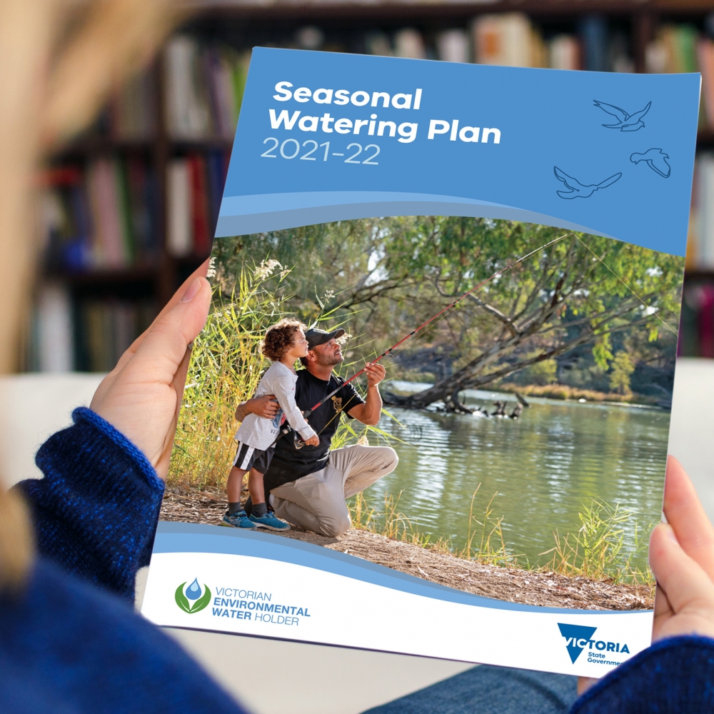 Victorian Environmental Water Holders Seasonal report designed by Bitevisual being read