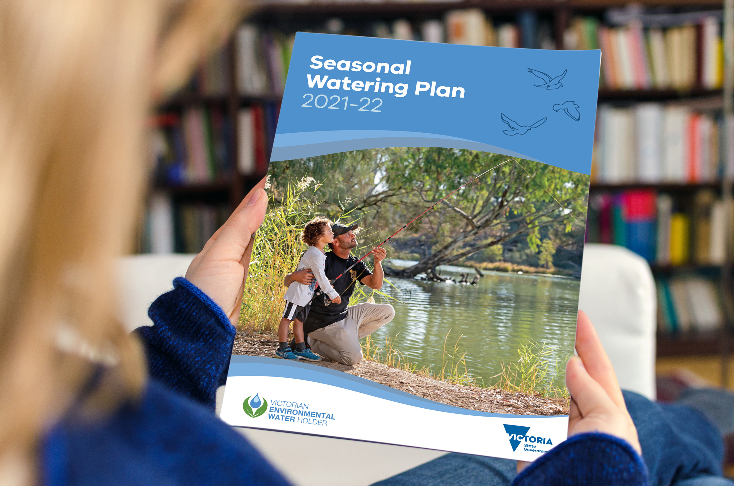 Victorian Environmental Water Holders Seasonal report designed by Bitevisual being read